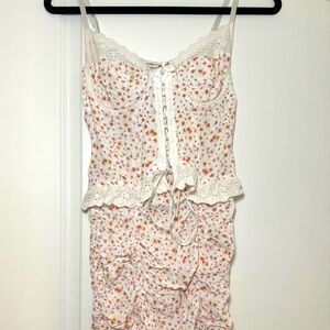 Floral white tight dress. So cute!!! Brand : Sky to Moon